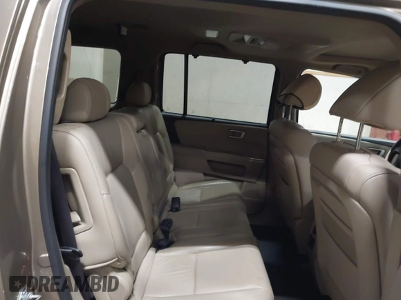 2011 Honda Pilot Touring with VIN 5FNYF4H92BB053458, listed as a IAAI auction lot 41594708 with 136,454 mi miles. Bid and sale history available at carsss.com. Image 8.