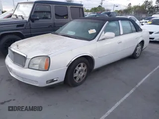 2004 Cadillac DeVille z VIN 1G6KD54Y14U172470, wystawiony jako IAAI lot #41803278 z przebiegiem 115 056 mil mil oraz . Historia ofert i sprzedaży dostępna na DreamBid. Obrazek 2.