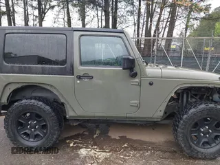 2007 Jeep Wrangler X with VIN 1J4FA24127L231409, listed as a IAAI auction lot 41971429 with 181,855 mi miles and . Bid and sale history available at carsss.com. Image 13.