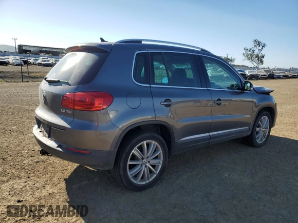2014 Volkswagen Tiguan SEL with VIN WVGAV3AX0EW555873, listed as a Copart auction lot 55695955 with 69,984 mi miles and Salvage title. Bid and sale history available at DreamBid. Image 3.