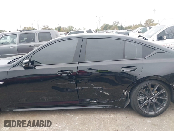 2024 Cadillac CT5 Sport z VIN 1G6DP5RK6R0107889, wystawiony jako IAAI lot #41030732 z przebiegiem Nie podano mil oraz . Historia ofert i sprzedaży dostępna na DreamBid. Obrazek 13.