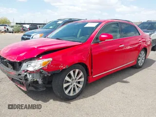 2011 Toyota Avalon with VIN 4T1BK3DB3BU404093, listed as a IAAI auction lot 42163714 with 129,847 mi miles and . Bid and sale history available at carsss.com. Image 2.