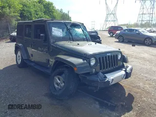 2015 Jeep Wrangler Unlimited Altitude z VIN 1C4HJWEG0FL752152, wystawiony jako IAAI lot #42311043 z przebiegiem 112 379 mil mil oraz . Historia ofert i sprzedaży dostępna na DreamBid. Obrazek 6.