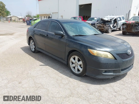 2009 Toyota Camry with VIN 4T1BE46K69U879189, listed as a IAAI auction lot 42088458 with 215,006 mi miles. Bid and sale history available at carsss.com. Image 1.