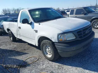 2003 Ford F-150 XL with VIN 1FTRF17W13NB65293, listed as a IAAI auction lot 41264978 with Not Provided miles and . Bid and sale history available at DreamBid. Image 1.