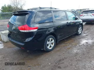 2013 Toyota Sienna LE AAS with VIN 5TDKK3DC8DS401419, listed as a IAAI auction lot 42007146 with 182,651 mi miles. Bid and sale history available at carsss.com. Image 4.