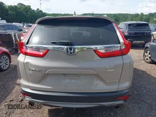 2018 Honda CR-V Touring with VIN 5J6RW2H96JL000910, listed as a IAAI auction lot 42490580 with 201,534 mi miles and . Bid and sale history available at DreamBid. Image 16.