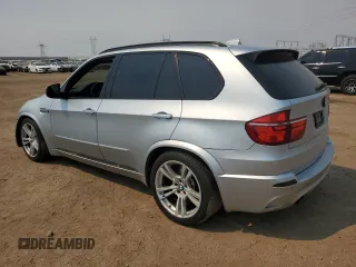 2011 BMW X5 M with VIN 5YMGY0C58BLK26357, listed as a Copart auction lot 71443774 with 116,973 mi miles and Salvage Title. Bid and sale history available at carsss.com. Image 2.