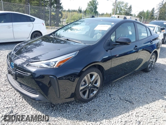2021 Toyota Prius L Eco with VIN JTDKAMFU8M3136565, listed as a IAAI auction lot 42161896 with 39,634 mi miles and . Bid and sale history available at DreamBid. Image 2.