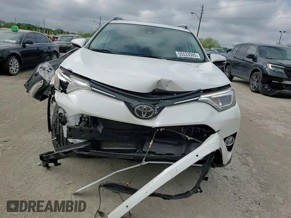 2016 Toyota RAV4 Limited with VIN 2T3DFREVXGW495077, listed as a Copart auction lot 55533505 with 122,483 mi miles and Salvage title. Bid and sale history available at DreamBid. Image 14.