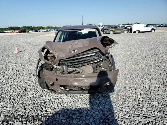 2011 MINI Countryman with VIN WMWZB3C53BWM00724, listed as a Copart auction lot 52293575 with Not Provided miles and Salvage Title. Bid and sale history available at DreamBid. Image 11.