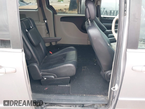 2017 Dodge Grand Caravan SXT with VIN 2C4RDGCG2HR842871, listed as a IAAI auction lot 42074716 with 174,227 mi miles and . Bid and sale history available at DreamBid. Image 8.