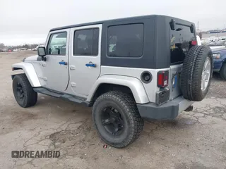2008 Jeep Wrangler Unlimited Sahara с VIN 1J4GA59138L505460, выставлен на аукционе IAAI как лот 41846611 с пробегом 116 658 миль миль и . История ставок и продаж доступна на DreamBid. Изображение 3.