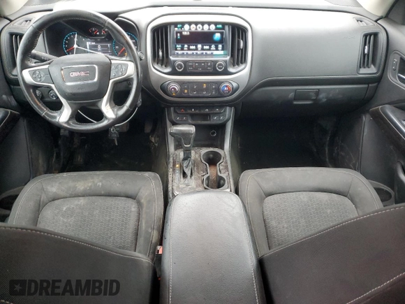 2018 GMC Canyon 4WD SLE z VIN 1GTG6CEN4J1100617, wystawiony jako Copart lot #53282695 z przebiegiem 112 033 mil mil oraz Szkoda całkowita • Salvage title. Historia ofert i sprzedaży dostępna na DreamBid. Obrazek 8.