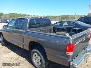 2002 Dodge Dakota SLT with VIN 1B7HG48NX2S623588, listed as a IAAI auction lot 41793068 with 213,159 mi miles. Bid and sale history available at carsss.com. Image 3.
