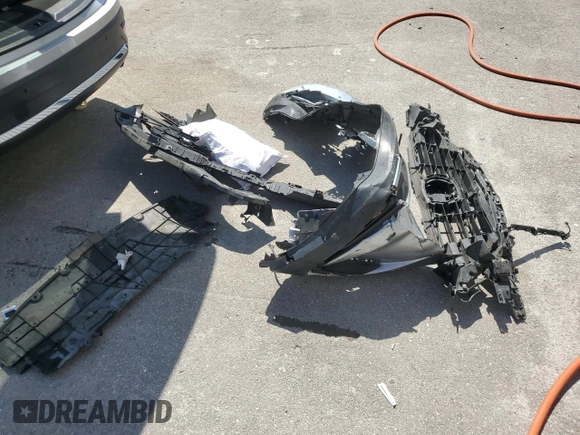 2020 Mazda CX-9 Grand Touring z VIN JM3TCADY1L0408805, wystawiony jako Copart lot #57993725 z przebiegiem 118 424 mil mil oraz Nie do naprawy • Non repairable. Historia ofert i sprzedaży dostępna na DreamBid. Obrazek 13.
