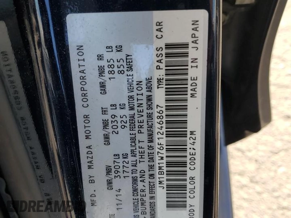 2015 Mazda 3 i Grand Touring with VIN JM1BM1W76F1246867, listed as a Copart auction lot 60318265 with 106,757 mi miles and Salvage title. Bid and sale history available at DreamBid. Image 12.
