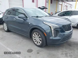 2019 Cadillac XT4 AWD Luxury with VIN 1GYFZBR41KF160352, listed as a IAAI auction lot 42047477 with 58,850 mi miles and . Bid and sale history available at DreamBid. Image 1.