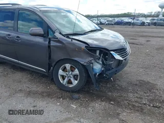 2012 Toyota Sienna LE AAS with VIN 5TDKK3DC5CS270481, listed as a IAAI auction lot 42093687 with 208,899 mi miles. Bid and sale history available at carsss.com. Image 17.