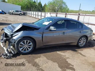 2015 Infiniti Q50 z VIN JN1BV7AP6FM335914, wystawiony jako IAAI lot #42065648 z przebiegiem 192 986 mil mil oraz . Historia ofert i sprzedaży dostępna na DreamBid. Obrazek 15.