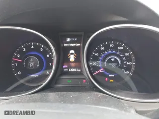 2013 Hyundai Santa Fe Sport with VIN 5XYZUDLB8DG078350, listed as a IAAI auction lot 41888307 with 130,811 mi miles. Bid and sale history available at carsss.com. Image 7.