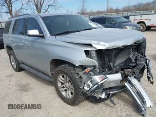 2015 Chevrolet Tahoe LT with VIN 1GNSCBKC4FR552034, listed as a IAAI auction lot 41891302 with 145,969 mi miles and . Bid and sale history available at DreamBid. Image 1.