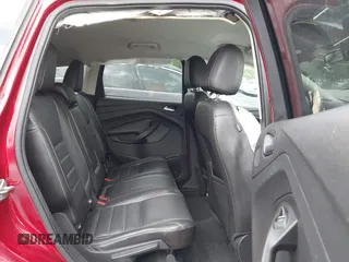 2016 Ford Escape Titanium with VIN 1FMCU9JX0GUA29353, listed as a IAAI auction lot 42133326 with 143,892 mi miles and . Bid and sale history available at DreamBid. Image 8.