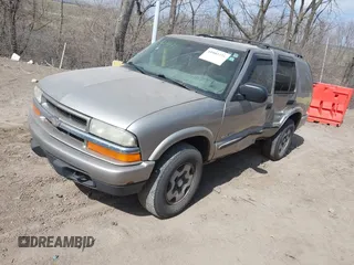 2004 Chevrolet Blazer LS z VIN 1GNDT13X04K164924, wystawiony jako IAAI lot #41803471 z przebiegiem 166 708 mil mil oraz . Historia ofert i sprzedaży dostępna na DreamBid. Obrazek 17.