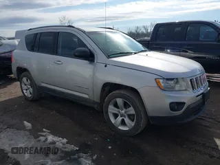 2011 Jeep Compass with VIN 1J4NT1FB4BD252724, listed as a IAAI auction lot 41247389 with 162,028 mi miles. Bid and sale history available at carsss.com. Image 1.