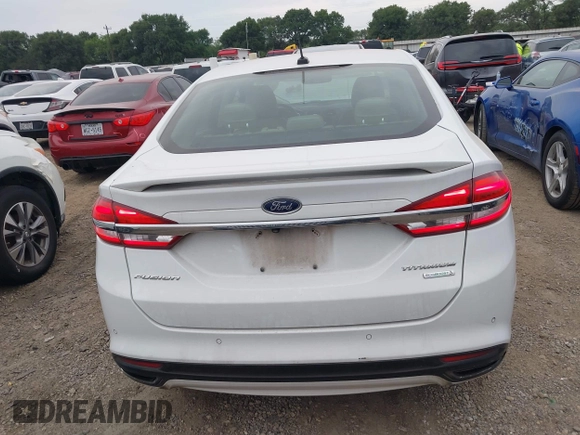 2017 Ford Fusion Titanium z VIN 3FA6P0K96HR124146, wystawiony jako IAAI lot #42428041 z przebiegiem 204 306 mil mil oraz . Historia ofert i sprzedaży dostępna na DreamBid. Obrazek 16.