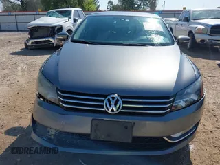 2015 Volkswagen Passat 1.8T Wolfsburg Ed with VIN 1VWAT7A3XFC115934, listed as a IAAI auction lot 41948035 with 243,143 mi miles. Bid and sale history available at carsss.com. Image 13.