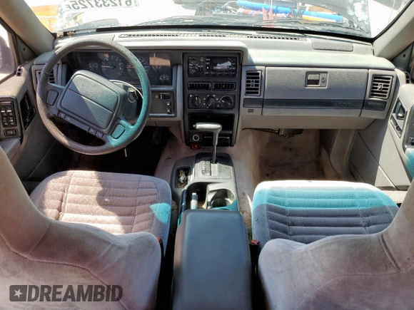 1995 Jeep Grand Cherokee Laredo z VIN 1J4FX58S9SC534442, wystawiony jako Copart lot #61233725 z przebiegiem 363 688 mil mil oraz Szkoda całkowita • Salvage title. Historia ofert i sprzedaży dostępna na DreamBid. Obrazek 8.