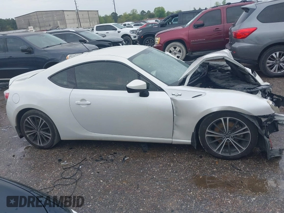 2013 Scion FR-S with VIN JF1ZNAA16D1718602, listed as a IAAI auction lot 41875857 with 101,649 mi miles. Bid and sale history available at carsss.com. Image 13.