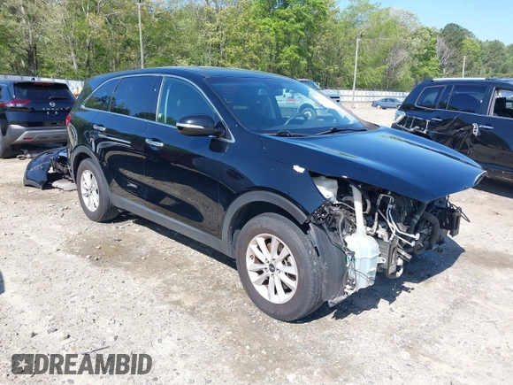 2019 Kia Sorento L with VIN 5XYPG4A38KG574269, listed as a IAAI auction lot 42003610 with 129,896 mi miles and . Bid and sale history available at DreamBid. Image 1.