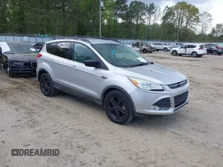 2014 Ford Escape SE with VIN 1FMCU9GX9EUA57799, listed as a IAAI auction lot 41967422 with 133,377 mi miles. Bid and sale history available at carsss.com. Image 1.