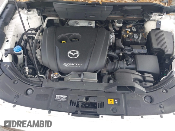 2018 Mazda CX-5 Touring z VIN JM3KFACM6J1419663, wystawiony jako IAAI lot #41879677 z przebiegiem 115 224 mil mil oraz . Historia ofert i sprzedaży dostępna na DreamBid. Obrazek 10.