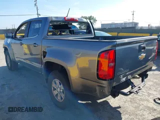 2018 Chevrolet Colorado 2WD Work Truck with VIN 1GCGSBEAXJ1199141, listed as a IAAI auction lot 42322849 with 77,811 mi miles and . Bid and sale history available at DreamBid. Image 3.
