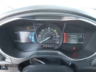 2014 Ford Fusion Titanium Hybrid with VIN 3FA6P0RU9ER147443, listed as a IAAI auction lot 41739540 with 146,359 mi miles. Bid and sale history available at carsss.com. Image 7.