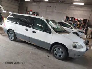 2006 Ford Freestar Cargo with VIN 2FTZA54666BA14556, listed as a IAAI auction lot 42103437 with 147,998 mi miles. Bid and sale history available at carsss.com. Image 1.
