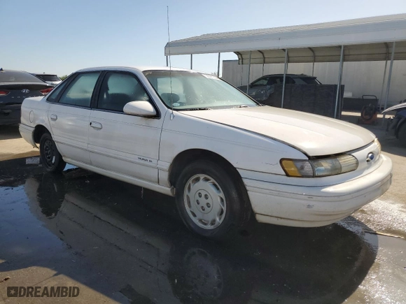 1994 Ford Taurus GL with VIN 1FALP52U7RG261559, listed as a Copart auction lot 55681304 with 28,675 mi miles and Salvage Title. Bid and sale history available at carsss.com. Image 4.