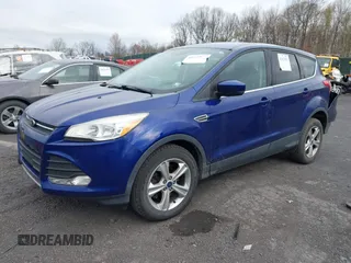 2015 Ford Escape SE with VIN 1FMCU9GX4FUC73125, listed as a IAAI auction lot 42071815 with 71,681 mi miles. Bid and sale history available at carsss.com. Image 2.