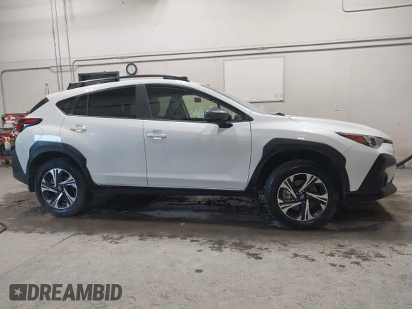 2024 Subaru Crosstrek Premium z VIN JF2GUADC0R8299759, wystawiony jako IAAI lot #42483847 z przebiegiem 12 663 mil mil oraz . Historia ofert i sprzedaży dostępna na DreamBid. Obrazek 14.