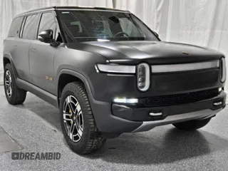 2023 Rivian R1S Launch Edition with VIN 7PDSGABL2PN020404, listed as a Copart auction lot 81428984 with 128 mi miles and Clean Title. Bid and sale history available at carsss.com. Image 1.