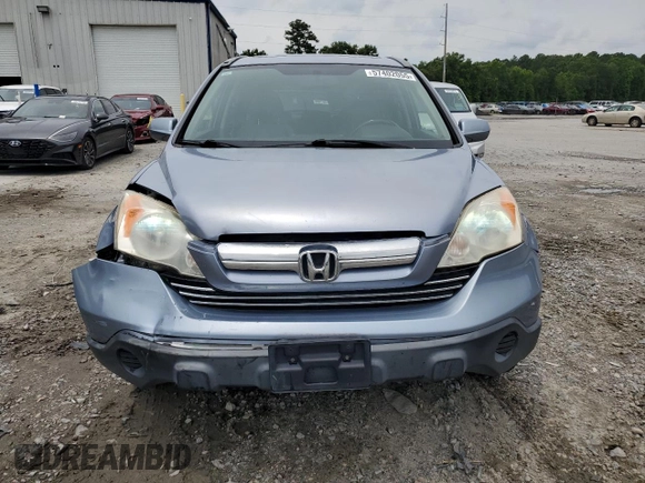 2009 Honda CR-V EX-L z VIN JHLRE48709C008700, wystawiony jako Copart lot #57402055 z przebiegiem 162 825 mil mil oraz Szkoda całkowita • Salvage title. Historia ofert i sprzedaży dostępna na DreamBid. Obrazek 5.