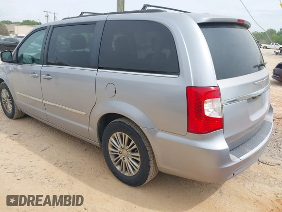 2014 Chrysler Town & Country Touring L with VIN 2C4RC1CG9ER376058, listed as a IAAI auction lot 42099348 with 186,226 mi miles and . Bid and sale history available at DreamBid. Image 3.