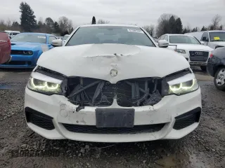 2018 BMW 5 Series 530e xDrive z VIN WBAJB1C56JB084422, wystawiony jako Copart lot #47596335 z przebiegiem 68 276 mil mil oraz Szkoda całkowita • Salvage title. Historia ofert i sprzedaży dostępna na DreamBid. Obrazek 5.