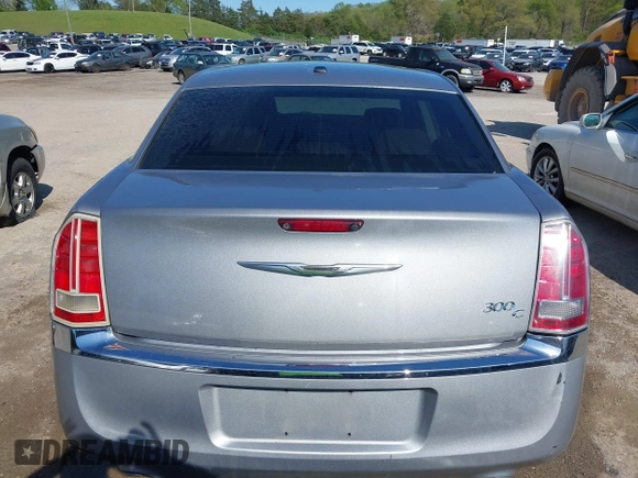 2013 Chrysler 300 C with VIN 2C3CCAEG7DH727559, listed as a IAAI auction lot 41990806 with 201,182 mi miles and . Bid and sale history available at DreamBid. Image 16.