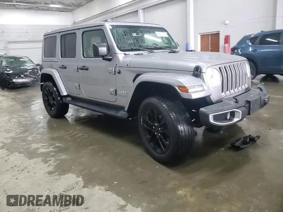 2021 Jeep Wrangler Unlimited Sahara with VIN 1C4JJXP65MW682462, listed as a Copart auction lot 58673385 with 38,714 mi miles and Salvage title. Bid and sale history available at DreamBid. Image 13.