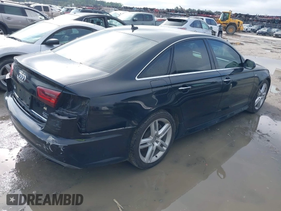 2016 Audi A6 Premium Plus z VIN WAUGFAFCXGN121312, wystawiony jako IAAI lot #41923717 z przebiegiem 215 000 mil mil oraz . Historia ofert i sprzedaży dostępna na DreamBid. Obrazek 4.