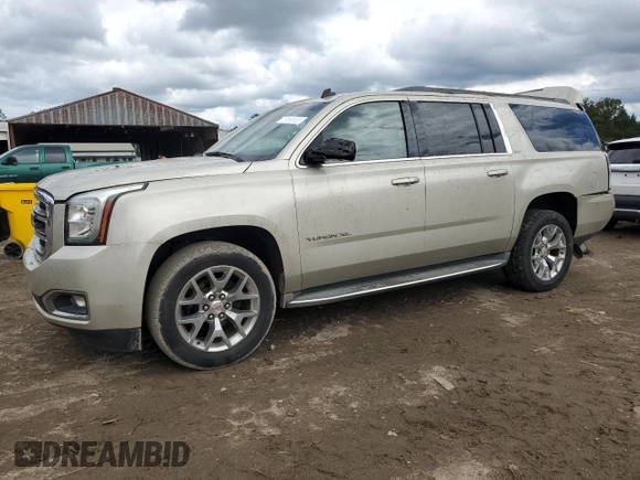 2015 GMC Yukon XL SLT with VIN 1GKS1HKC5FR168608, listed as a Copart auction lot 71564384 with 197,538 mi miles and Salvage Title. Bid and sale history available at carsss.com. Image 1.